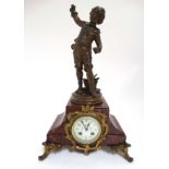 French Mantle Clock : an Auguste Moreau bronzed figure topped ' Sortie D'Ecole ( leaving School)