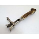 Ham Hock Holder / gigot bone holder : of antler and silver plate, measuring 8" long.