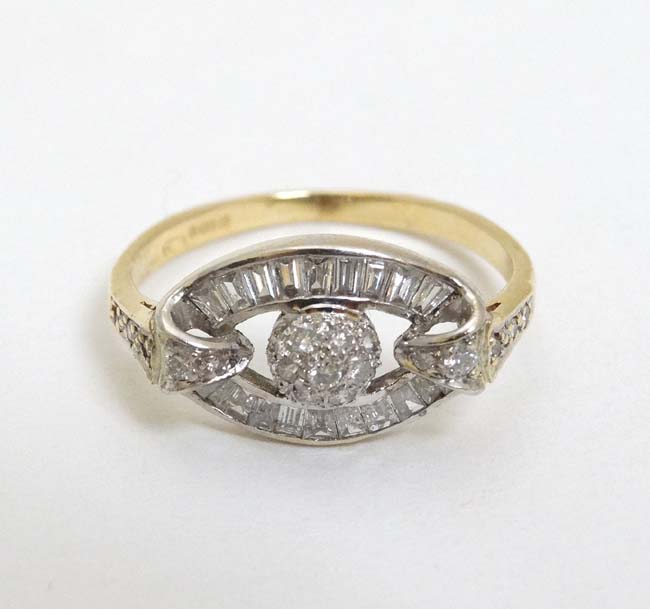 An 18ct gold ring set with baguette and chip set diamonds CONDITION: Please Note -