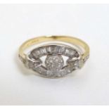 An 18ct gold ring set with baguette and chip set diamonds CONDITION: Please Note -
