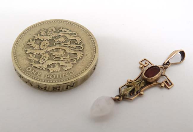 A 10k gold pedant set with red stone and white stone drop. - Image 3 of 4