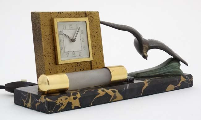 Art Deco bedside light and clock : a French marble base with swooping sea bird and wind up clock