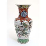 A large Japanese flared rim Vase decorated in polychrome to sides with warring Samurai,