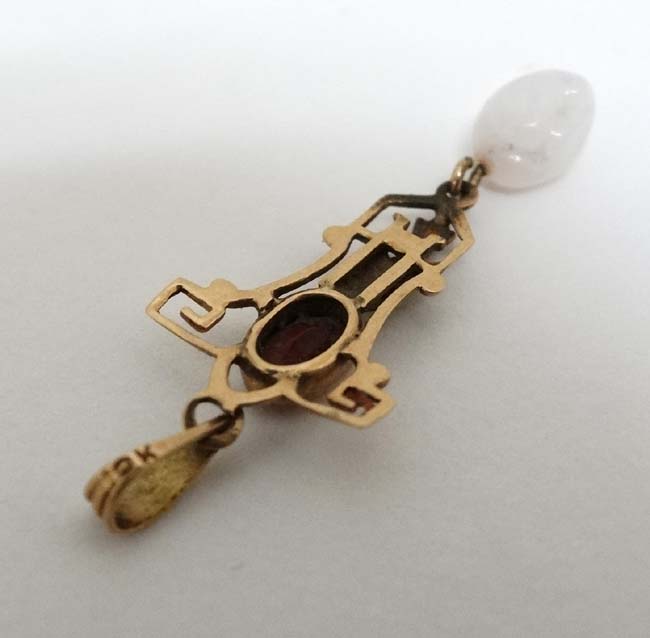 A 10k gold pedant set with red stone and white stone drop. - Image 4 of 4