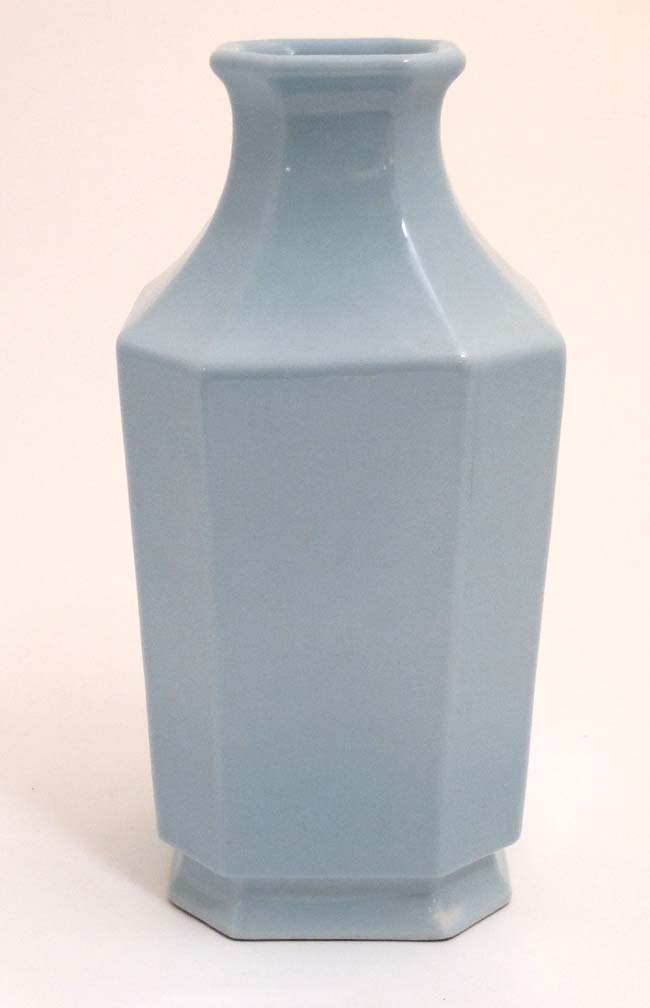 A pale blue celadon glaze Chinese vase of canted form, bears blue Chinese seal mark to base.