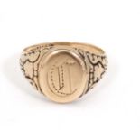 An early 20thC yellow metal mourning / memorial ring with central locket section.