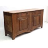 Arts and Crafts : An oak dresser base with strap hinges etc 69" wide x 21" deep x 35" high