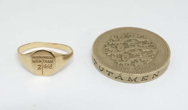 A 9ct gold small signet ring / child's ring engraved Greenwich Meridian 2000 CONDITION: - Image 3 of 3