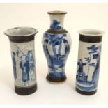 A collection of 3 Chinese blue and white crackle glazed vases to include a flared rim cylinder vase