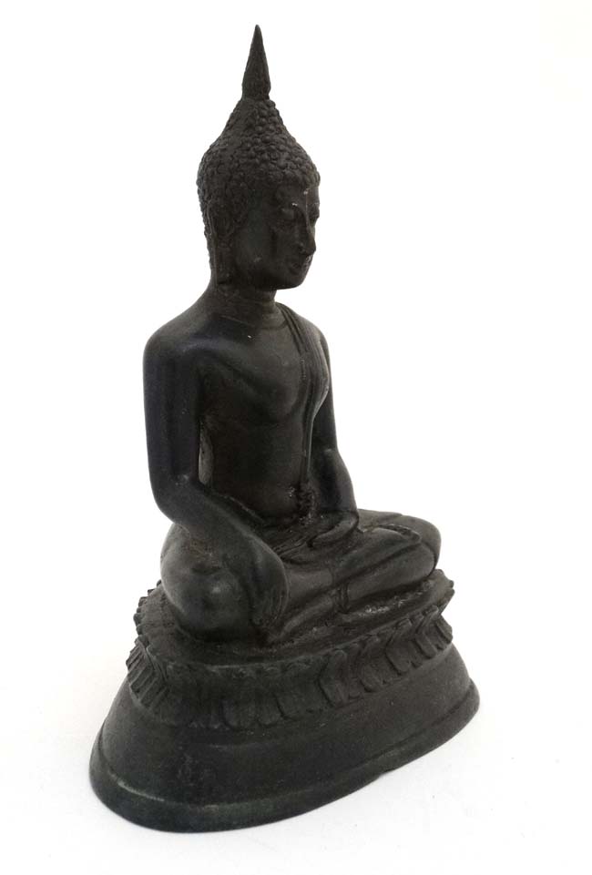An Oriental cased patinated bronze figure of a seated buddaha on lotus flower base, - Image 3 of 4