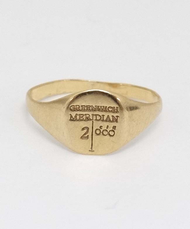 A 9ct gold small signet ring / child's ring engraved Greenwich Meridian 2000 CONDITION: