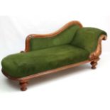 A mahogany chaise longue ( right to left ) with carved show wood and green upholstery.