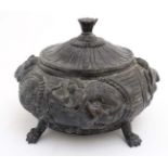 An early 20thC patinated bronze Grand Tour museum copy of a lidded urn after the antique depicting