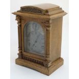 3 Train Musical Clock : an oak cased c.