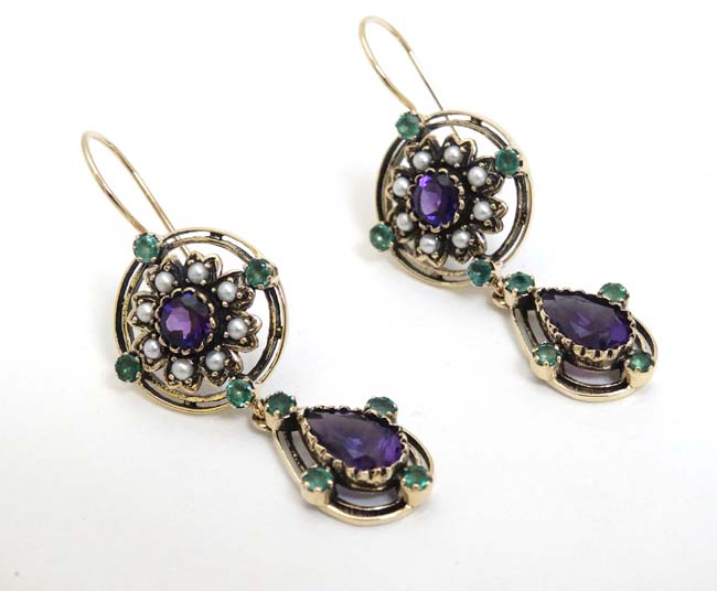 A pair of .925 silver gilt drop earrings set with amethyst, green stones and seed pearls.