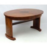 Art Deco : a Walnut 1/4 opposing veneered oval dining table bearing label for : ' The ' Ee Zi Way