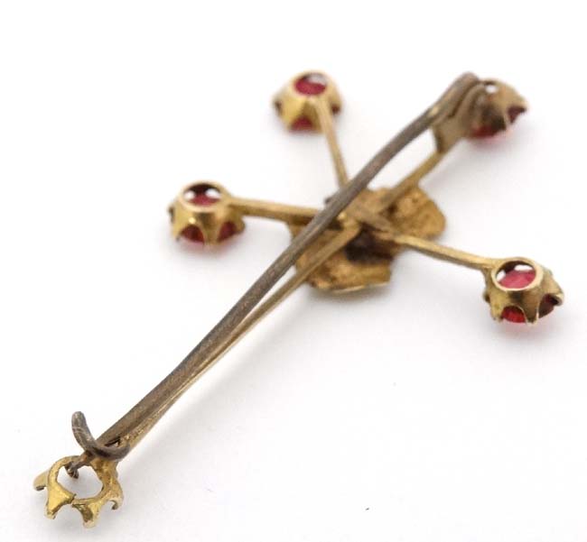 A 9ct gold ' Southern Cross' brooch with outline of Australia to centre and set with red stones. - Image 5 of 6