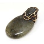A pendant set with moss agate like hardstone cabochon 2 ¾” long CONDITION: Please