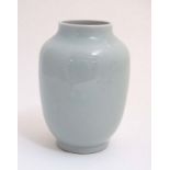 A Chinese Celadon vase, in a pale green glaze. 10'' high.