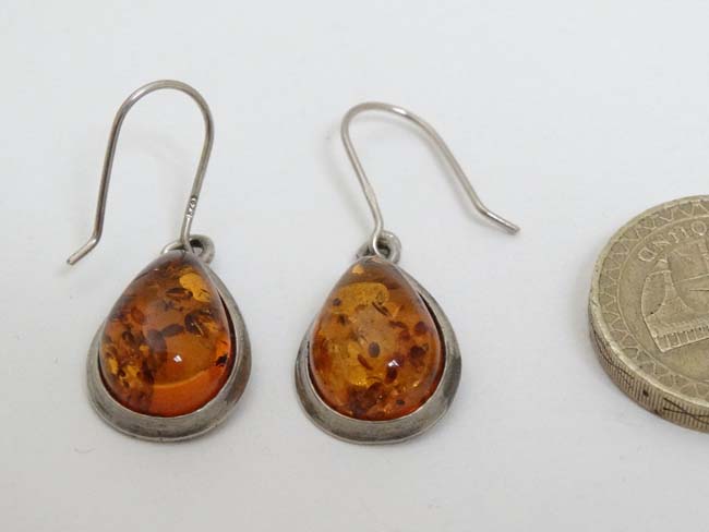 A pair of silver and white metal drop earrings set with amber. - Image 3 of 4