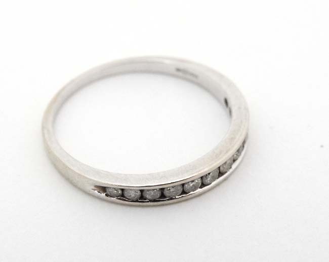 An 18ct white gold half eternity ring set with 12 diamonds CONDITION: Please Note - Image 3 of 4