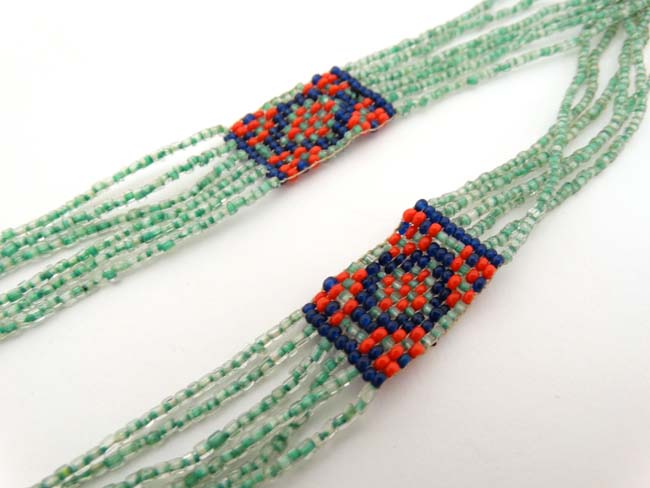 A vintage beadwork necklace with green blue and red bead decoration, hanging approx. - Image 2 of 6