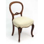 A Victorian mahogany over stuffed balloon back single chair 34 1/2" high CONDITION: