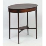 A 19thC mahogany oval 2-tier occasional table 26 3/4" long x 18 3/4" wide x 28 1/4" high