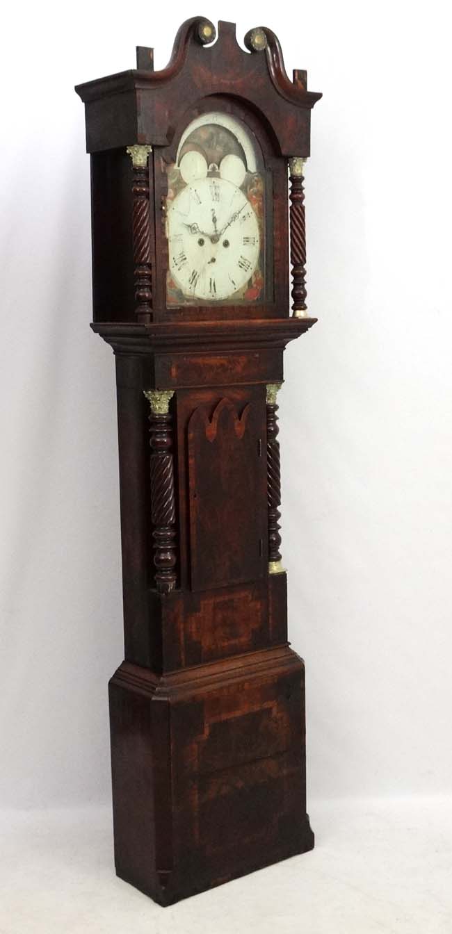 Longcase Clock : an Indistinctly signed early 19thC 14" breakarch painted dial with rolling moon,