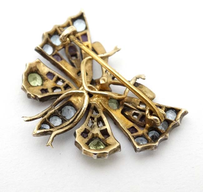 A yellow and white metal brooch formed as a butterfly set with a profusion of stones including - Image 4 of 4