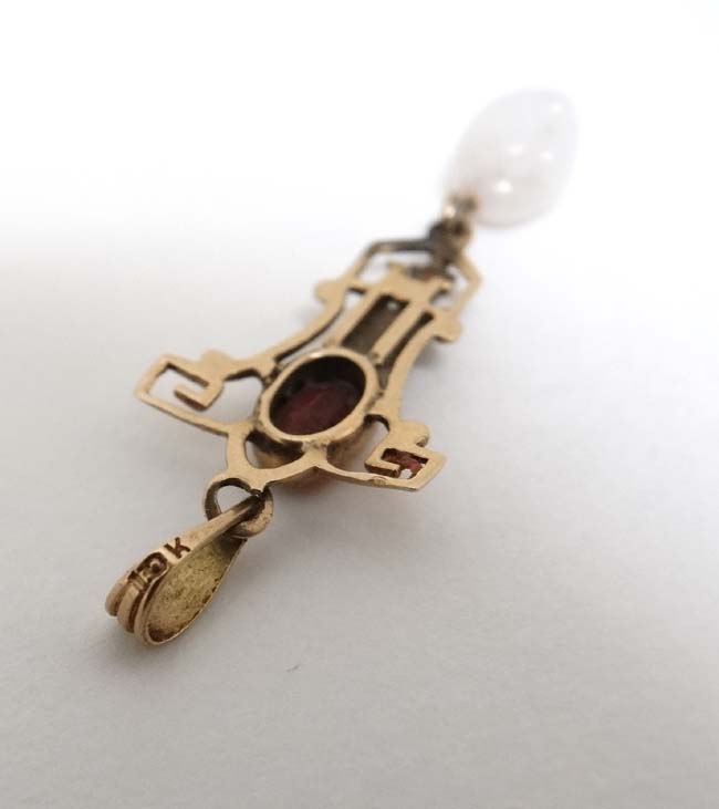 A 10k gold pedant set with red stone and white stone drop. - Image 2 of 4