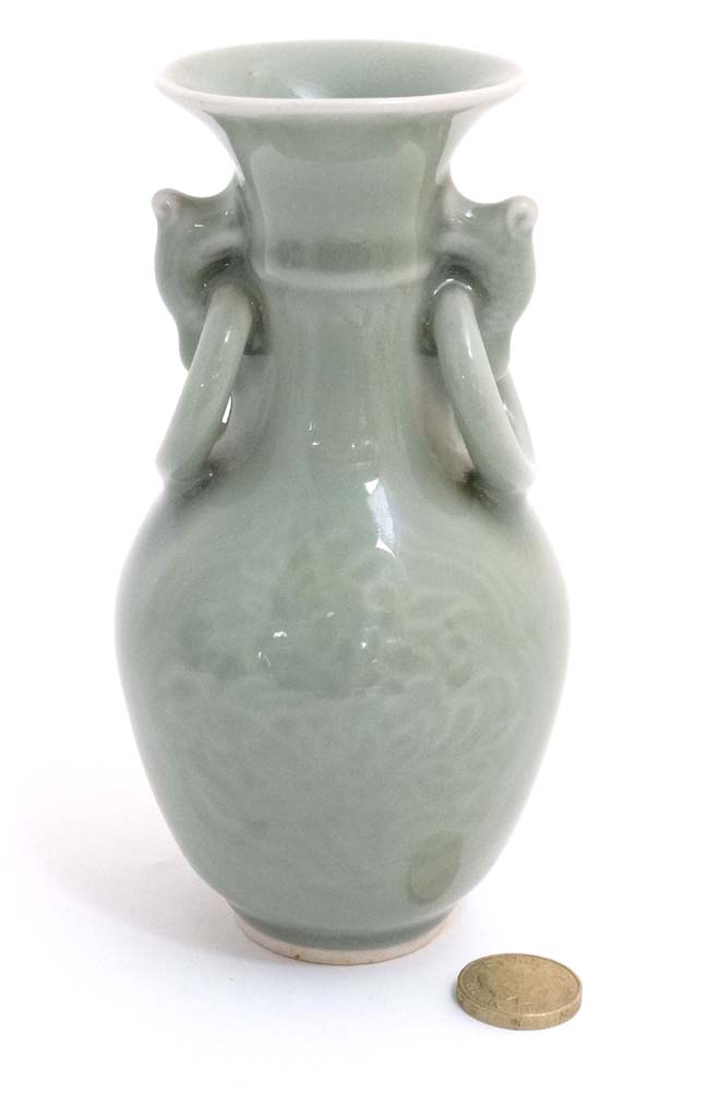A small Chinese celadon green twin handled bud vase, - Image 3 of 4