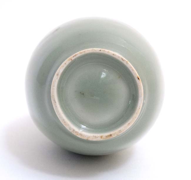 A small Chinese celadon green twin handled bud vase, - Image 2 of 4