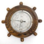Barometer : an aneroid circular with 4" diameter dial ,