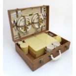 Picnic case : a late 1950'sBrexton Picnic case and contents , with faux buff leather covering,