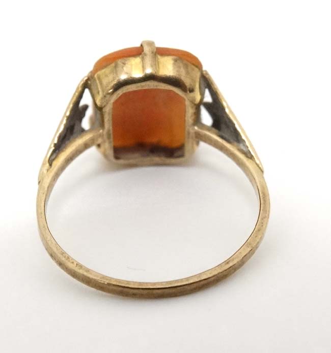 A 9ct gold ring set with cameo to top. - Image 3 of 4