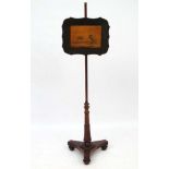 An early 19thC Rosewood pole screen,