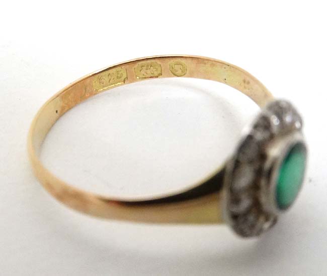 A 15ct gold ring set with central emerald bordered by diamonds CONDITION: Please - Image 5 of 5