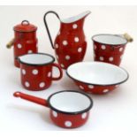 Kitchenalia : a French red bodied and white Polka Dot decorated enamel : jug , ewer, saucepan ,