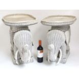 A pair of Lloyd Loom style novelty elephant formed occasional tables.