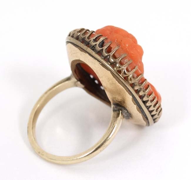 A 14k gold ring set with carved low relief coral cameo to centre CONDITION: Please - Image 4 of 4