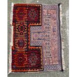 Carpet / Rug : An unusual woollen prayer rug having geometric patterns and shaped central section