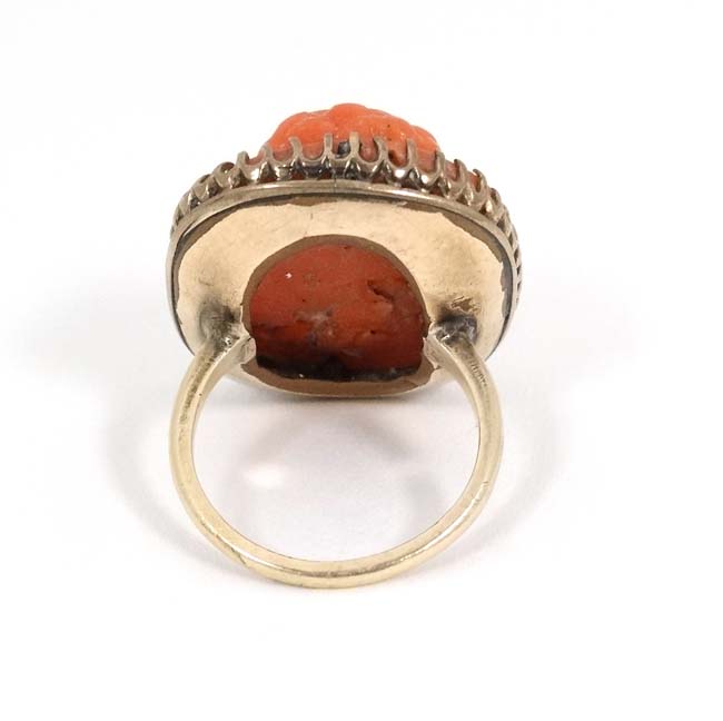 A 14k gold ring set with carved low relief coral cameo to centre CONDITION: Please - Image 3 of 4