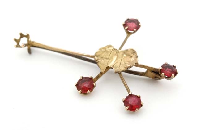 A 9ct gold ' Southern Cross' brooch with outline of Australia to centre and set with red stones. - Image 3 of 6