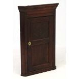 An 18thC oak panelled hanging corner cupboard 42" high CONDITION: Please Note - we