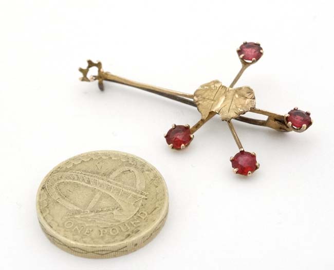 A 9ct gold ' Southern Cross' brooch with outline of Australia to centre and set with red stones. - Image 4 of 6