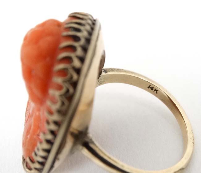 A 14k gold ring set with carved low relief coral cameo to centre CONDITION: Please - Image 2 of 4