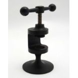 A cast iron table top nutcracker designed by Robert Welch.