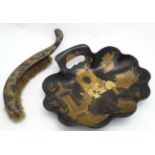 A late 19thC Oriental black lacquered papier mache crumb scoop and brush with gilt Chinoiserie