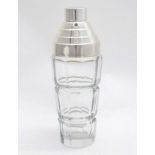 An Art Deco style glass cocktail shaker with silver plated mounts. 21stC.